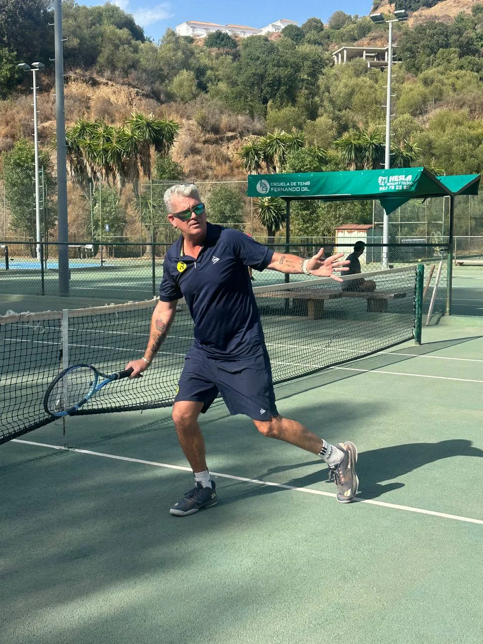 Rhino coach demonstrating a shot during a training session