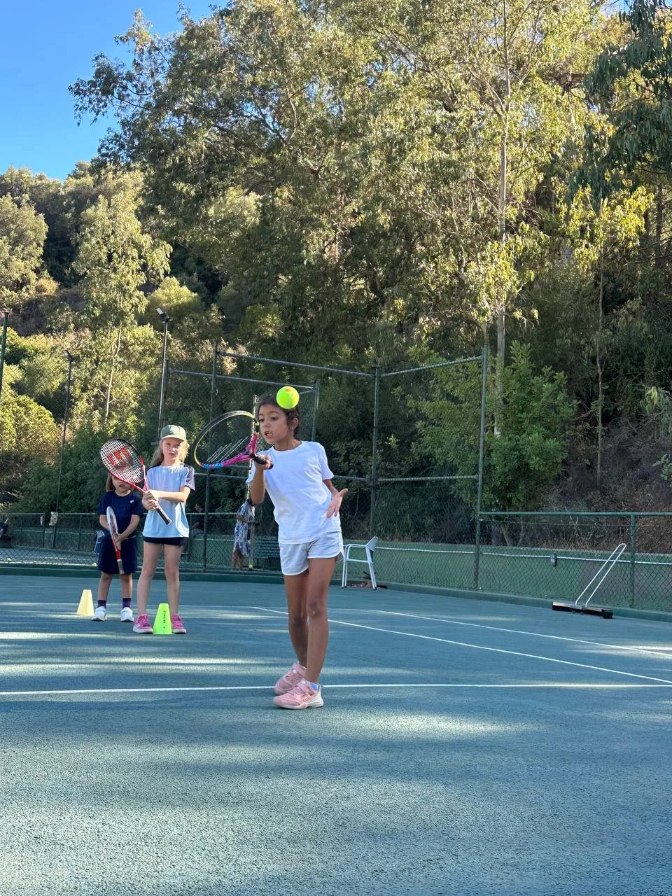 Young tennis player practising a shot at Rhino Tennis Academy